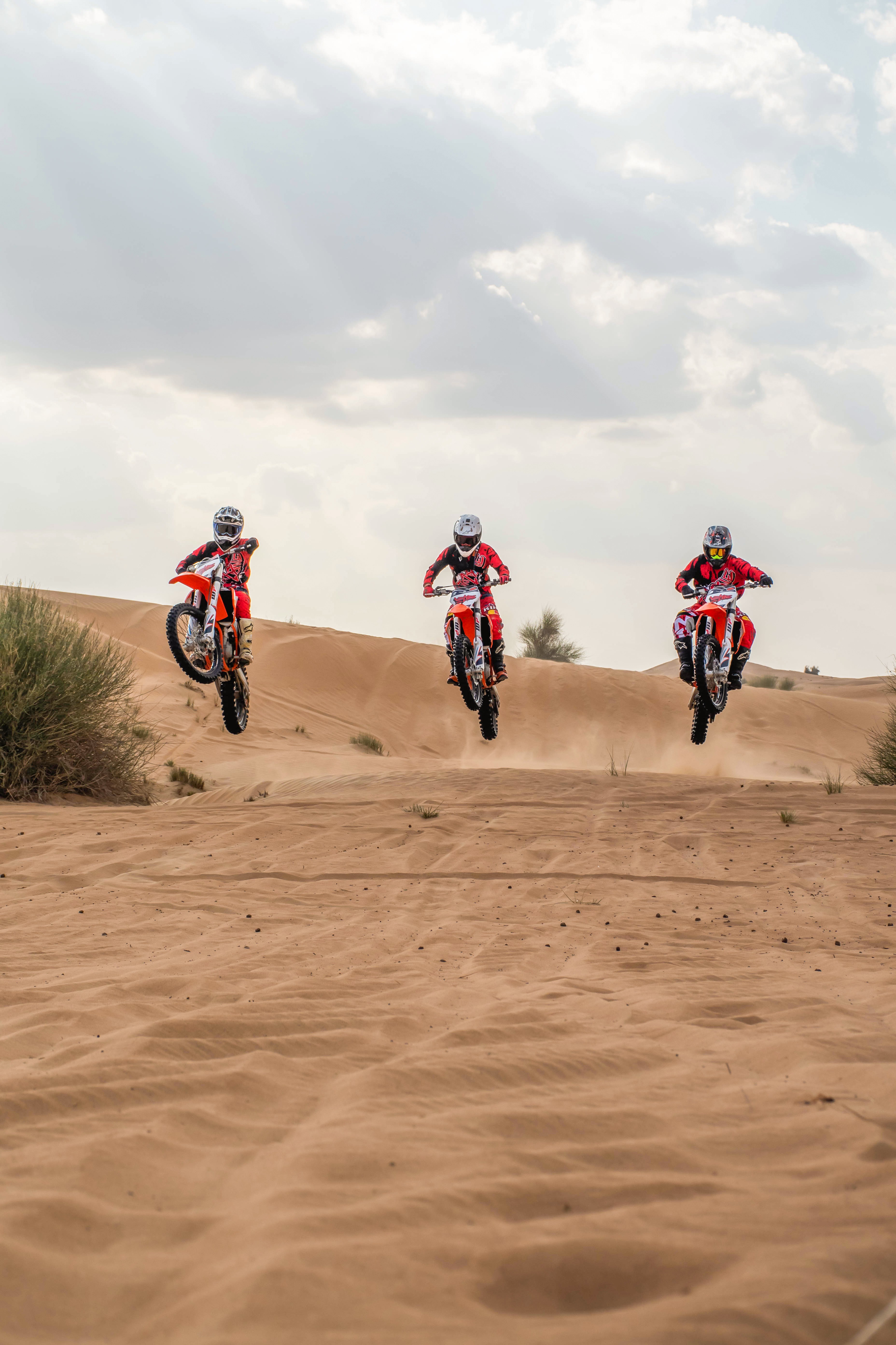 Professional GASGAS dirt bike workshop in Dubai with hydraulic lift, YATO tool cabinets, and motocross maintenance equipment