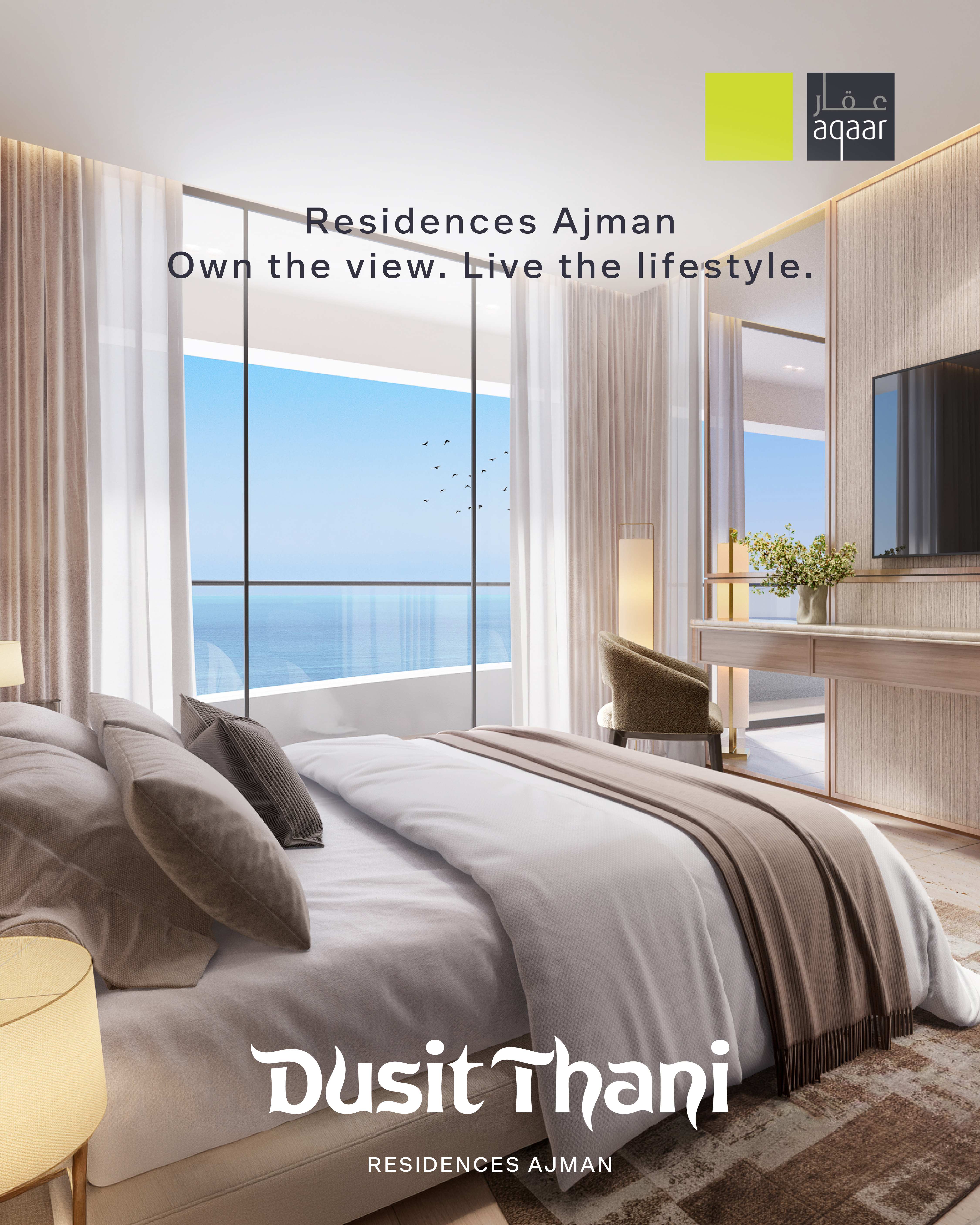 Luxury bedroom interior at Dusit Thani Residences Ajman featuring floor-to-ceiling windows with panoramic sea views.
